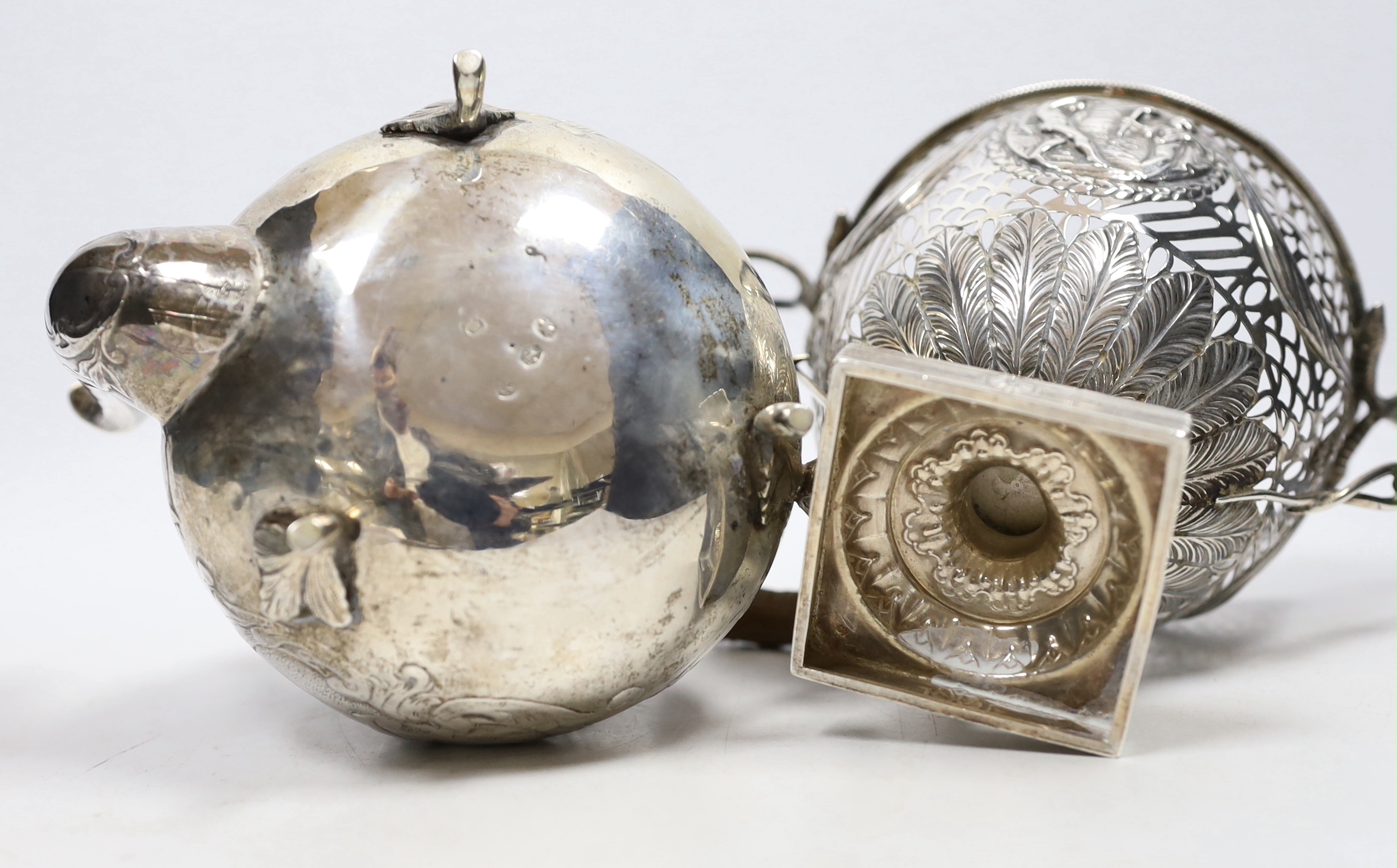 A late Victorian pierced silver neo-classical design sugar bowl, Chester 1900, 261 grams, and a 19th century Dutch silver teapot, decorated with classical figures and scrolls, gross 392 grams